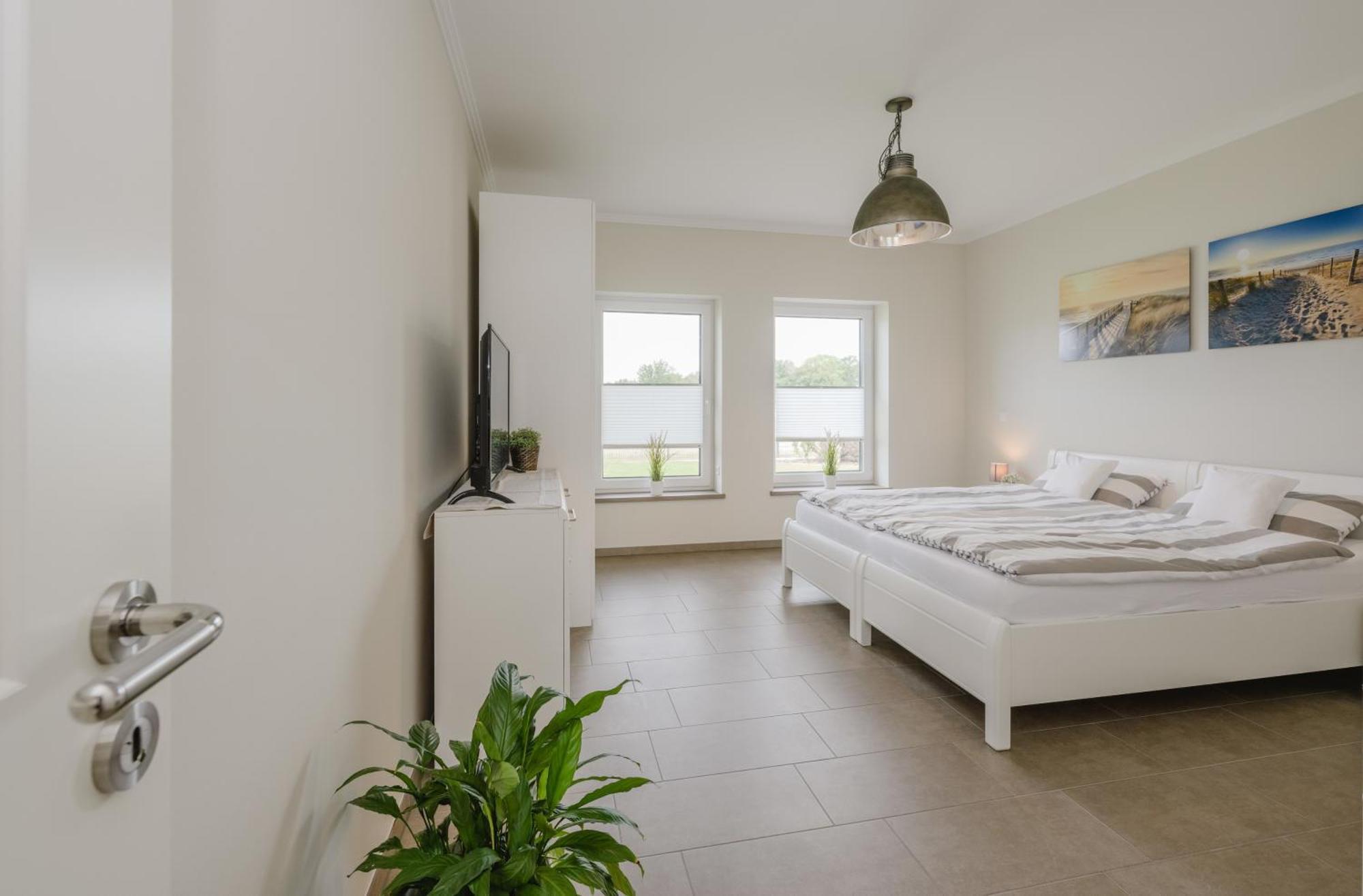 Ferienhaus Seeblick Walchum Buitenkant foto